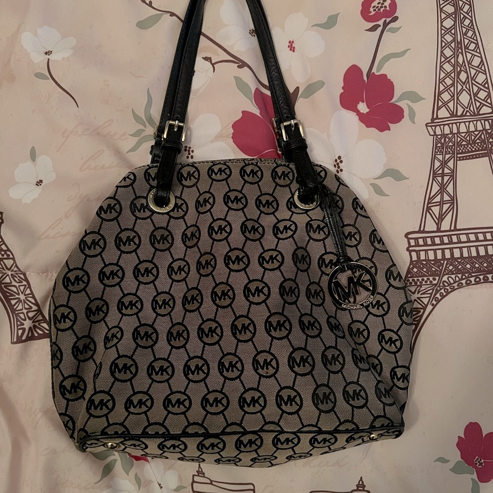 Michael Kors purse, tanish brown color in good condition